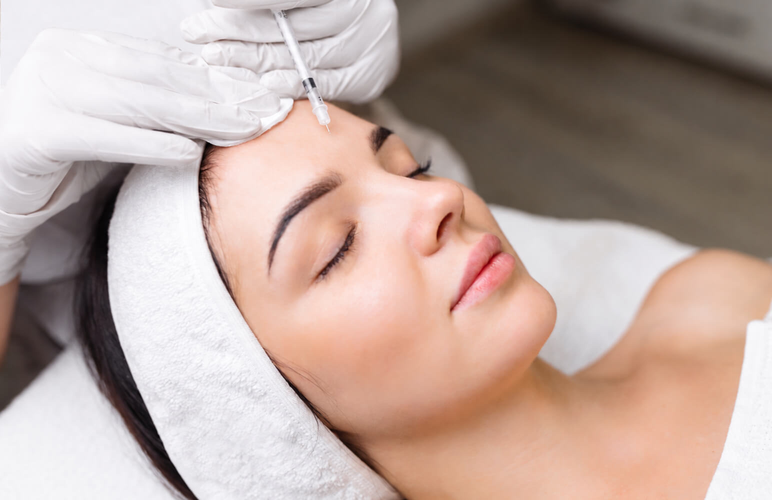 Patient receiving a Botox injection treatment at Coral Dermatology